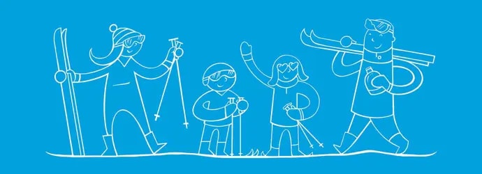 Famille qui skie ensemble avec du matériel de ski