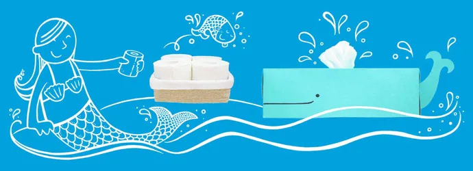 WC-paperirullat ja kotitekoinen, sinivalaan muotoinen vessapaperisäiliö, jonka päällä on piirretty merenneito